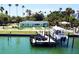 House with private dock and boat, offering waterfront access at 3108 S Maritana Dr, St Pete Beach, FL 33706