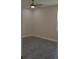 Simple bedroom with ceiling fan and gray vinyl flooring at 3915 W Robson St, Tampa, FL 33614