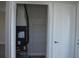Utility closet with HVAC unit and additional storage shelving at 3915 W Robson St, Tampa, FL 33614