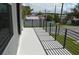 Private balcony with metal railing and city views at 3915 W Robson St, Tampa, FL 33614