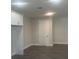 Living room featuring recessed lighting, wood-look tile flooring, and white trim and doors at 3915 W Robson St, Tampa, FL 33614