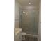 Large walk-in shower with glass enclosure and gray marble tile at 3915 W Robson St, Tampa, FL 33614