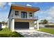 Modern two-story home with a large driveway at 3915 W Robson St, Tampa, FL 33614