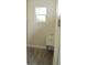 Laundry room with utility sink, vinyl flooring, and hook ups at 3915 W Robson St, Tampa, FL 33614