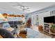 Comfortable living room with a TV, fireplace and plenty of seating at 3970 37Th S St # 14, St Petersburg, FL 33711