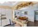 Kitchen with breakfast bar and view into dining area at 3970 37Th S St # 14, St Petersburg, FL 33711