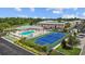 Aerial view showing pool, tennis court, and building at 3970 37Th S St # 14, St Petersburg, FL 33711