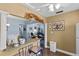 Kitchen breakfast bar with view into living room at 3970 37Th S St # 14, St Petersburg, FL 33711