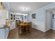 Charming dining room with wooden table and chairs at 3970 37Th S St # 14, St Petersburg, FL 33711