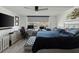 Bedroom includes a view of the water and a TV at 7600 Sun Island S Dr # 107, South Pasadena, FL 33707