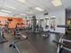 Well-equipped gym with cardio machines, weight training equipment and mirrored walls at 7600 Sun Island S Dr # 107, South Pasadena, FL 33707