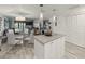 Bright open concept kitchen with center island and views of dining and living areas at 7600 Sun Island S Dr # 107, South Pasadena, FL 33707