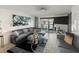 Living room boasts modern decor, comfortable seating, and scenic waterfront views at 7600 Sun Island S Dr # 107, South Pasadena, FL 33707