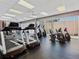 Fitness center with treadmills, ellipticals, and stationary bikes at 7600 Sun Island S Dr # 107, South Pasadena, FL 33707