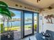 View from a screened porch with a water view at 7600 Sun Island S Dr # 107, South Pasadena, FL 33707