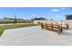 Spacious patio perfect for outdoor furniture, overlooking pond at 8968 Parsons Hill Blvd, Wesley Chapel, FL 33545