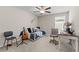 Bedroom with daybed, desk, and guitar at 8968 Parsons Hill Blvd, Wesley Chapel, FL 33545