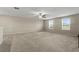 Spacious bonus room with neutral decor and a ceiling fan at 8968 Parsons Hill Blvd, Wesley Chapel, FL 33545