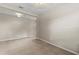 Spacious dining room with neutral-colored walls and tile floors at 8968 Parsons Hill Blvd, Wesley Chapel, FL 33545