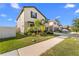 Two-story house with a two-car garage and palm trees at 8968 Parsons Hill Blvd, Wesley Chapel, FL 33545