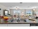 Modern kitchen with granite countertops and stainless steel appliances at 8968 Parsons Hill Blvd, Wesley Chapel, FL 33545
