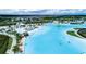 Large lagoon pool with surrounding amenities at 8968 Parsons Hill Blvd, Wesley Chapel, FL 33545