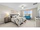 Large main bedroom with plush carpet and a sitting area at 8968 Parsons Hill Blvd, Wesley Chapel, FL 33545