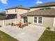 Backyard patio with seating area and plenty of space at 8968 Parsons Hill Blvd, Wesley Chapel, FL 33545