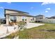 Spacious patio with seating area, perfect for outdoor entertaining at 8968 Parsons Hill Blvd, Wesley Chapel, FL 33545