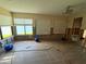 Living room with water view undergoing repairs at 17444 2Nd E St, Redington Shores, FL 33708