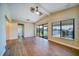 Living room with hardwood floors and access to canal views at 17444 2Nd E St, Redington Shores, FL 33708