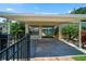 Covered patio with sliding glass doors and water views at 17444 2Nd E St, Redington Shores, FL 33708
