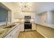 Modern kitchen with stainless steel appliances and granite counters at 17444 2Nd E St, Redington Shores, FL 33708
