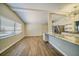 Spacious living room with hardwood floors and large window at 17444 2Nd E St, Redington Shores, FL 33708