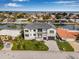 Aerial view of a waterfront home showing backyard access to the bay and neighborhood at 1954 Iowa Ne Ave, St Petersburg, FL 33703