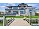 Waterfront home backyard with pool, dock, and boat lift at 1954 Iowa Ne Ave, St Petersburg, FL 33703