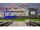 Waterfront property features a modern design with a pool, balcony, and dock for luxury living at 1954 Iowa Ne Ave, St Petersburg, FL 33703