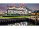This waterfront home features modern design, a backyard pool, and a private dock for boaters at 1954 Iowa Ne Ave, St Petersburg, FL 33703