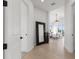 Bright foyer showcasing light wood floors and an open floor plan at 1954 Iowa Ne Ave, St Petersburg, FL 33703