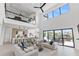 Open living space with high ceilings and water views provides an airy and modern atmosphere at 1954 Iowa Ne Ave, St Petersburg, FL 33703
