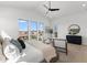 Bright, spacious main bedroom boasting high ceilings and large windows with water views at 1954 Iowa Ne Ave, St Petersburg, FL 33703
