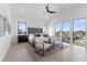 Bright, spacious main bedroom boasting high ceilings and large windows with water views at 1954 Iowa Ne Ave, St Petersburg, FL 33703