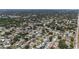 A lush, green neighborhood aerial view, showcasing beautiful homes and landscape at 2132 Academy Dr, Clearwater, FL 33764