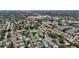 A neighborhood aerial view of a residential area with mature trees and manicured lawns at 2132 Academy Dr, Clearwater, FL 33764