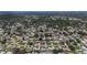 An expansive aerial view showcasing the community's layout, lush landscaping, and homes at 2132 Academy Dr, Clearwater, FL 33764