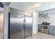 Stainless steel refrigerator in a newly remodeled kitchen at 2132 Academy Dr, Clearwater, FL 33764