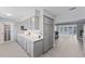 The updated kitchen has a breakfast bar and easy access to the dining and living areas at 2132 Academy Dr, Clearwater, FL 33764