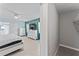 Main bedroom with dresser and entry to main bath at 2132 Academy Dr, Clearwater, FL 33764