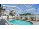An enclosed pool with a patio, offers a private outdoor retreat at 2132 Academy Dr, Clearwater, FL 33764
