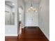 Bright entryway with hardwood floors, double doors, and an open floor plan at 2622 Bonterra Blvd, Valrico, FL 33594